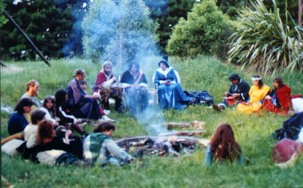 Eating supper around the camp fire.